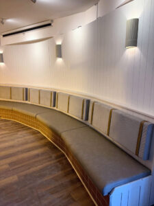 Banquette, Plain,with 2 tone finish,fabric back rest with a faux leather seat base.